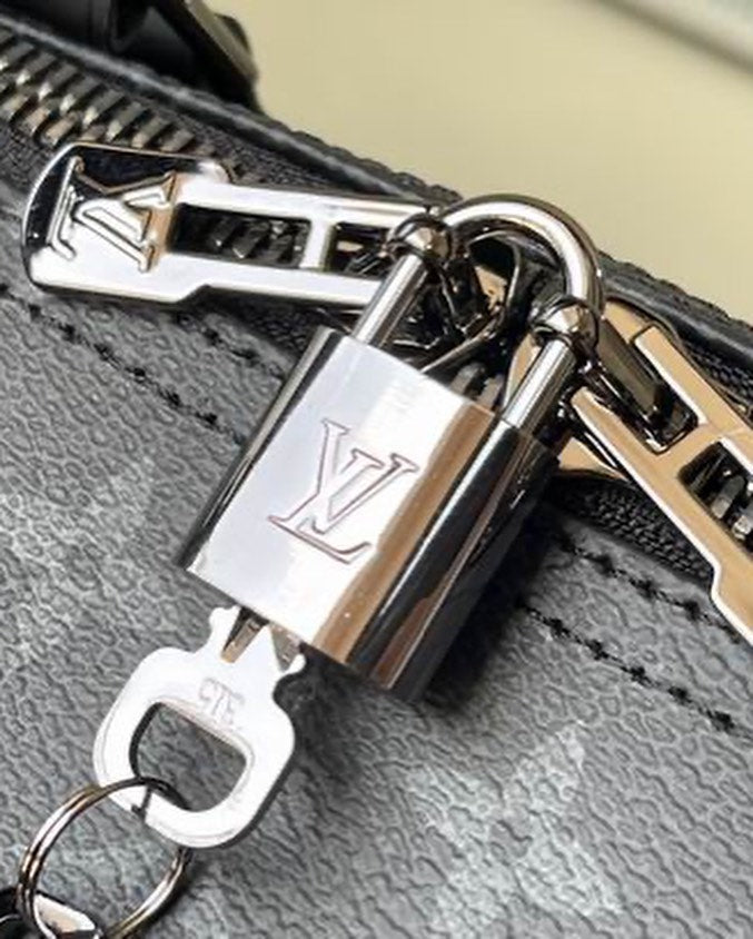 Louis Vuitton Monogram Titanium Keepall Bandouliere 50 - Grey